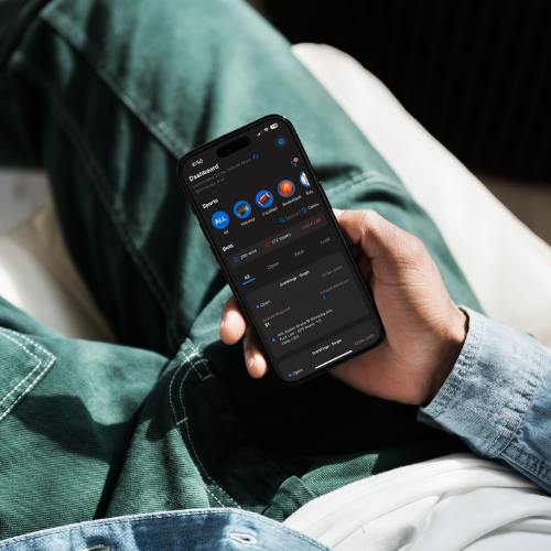 man laying down with myBetLocker bet tracking tool open on phone