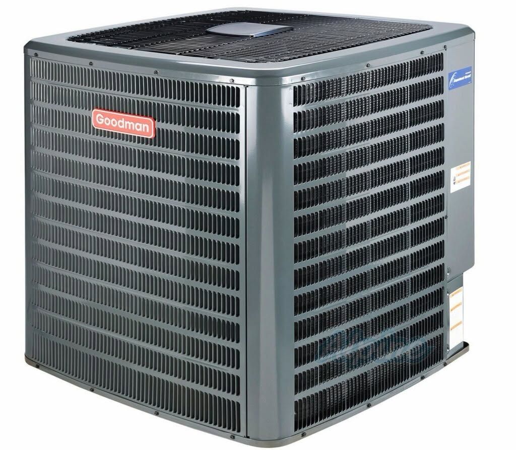 Gray outdoor HVAC air conditioner unit with metal grille and top fan, shown on a white background