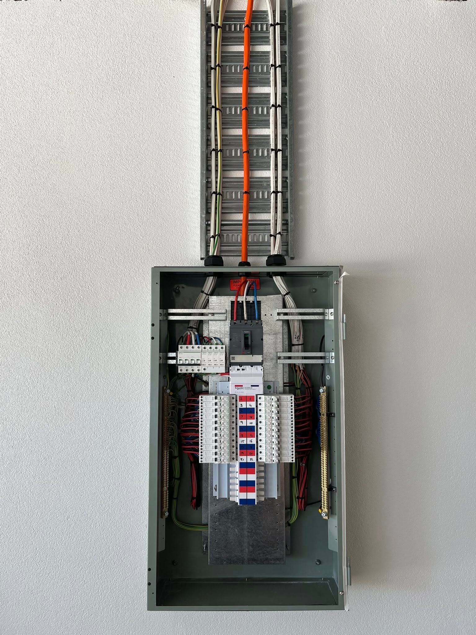 Electrical Panel With Exposed Wiring and Circuit Breakers — Top Spark Electrical FNQ in Atherton, QLD