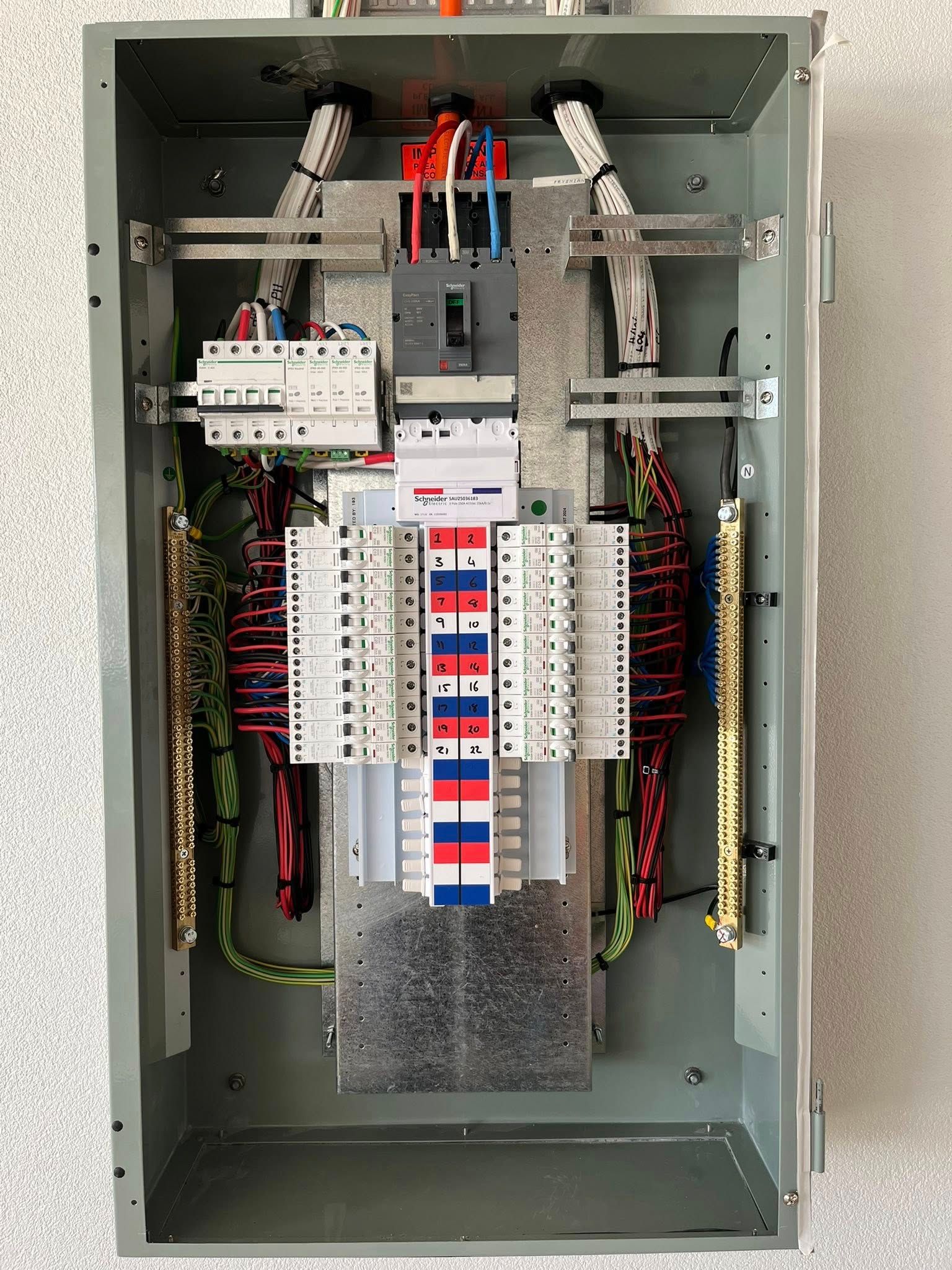 Open Electrical Control Panel With Wiring, and Breakers — Top Spark Electrical FNQ in Bayview Heights, QLD