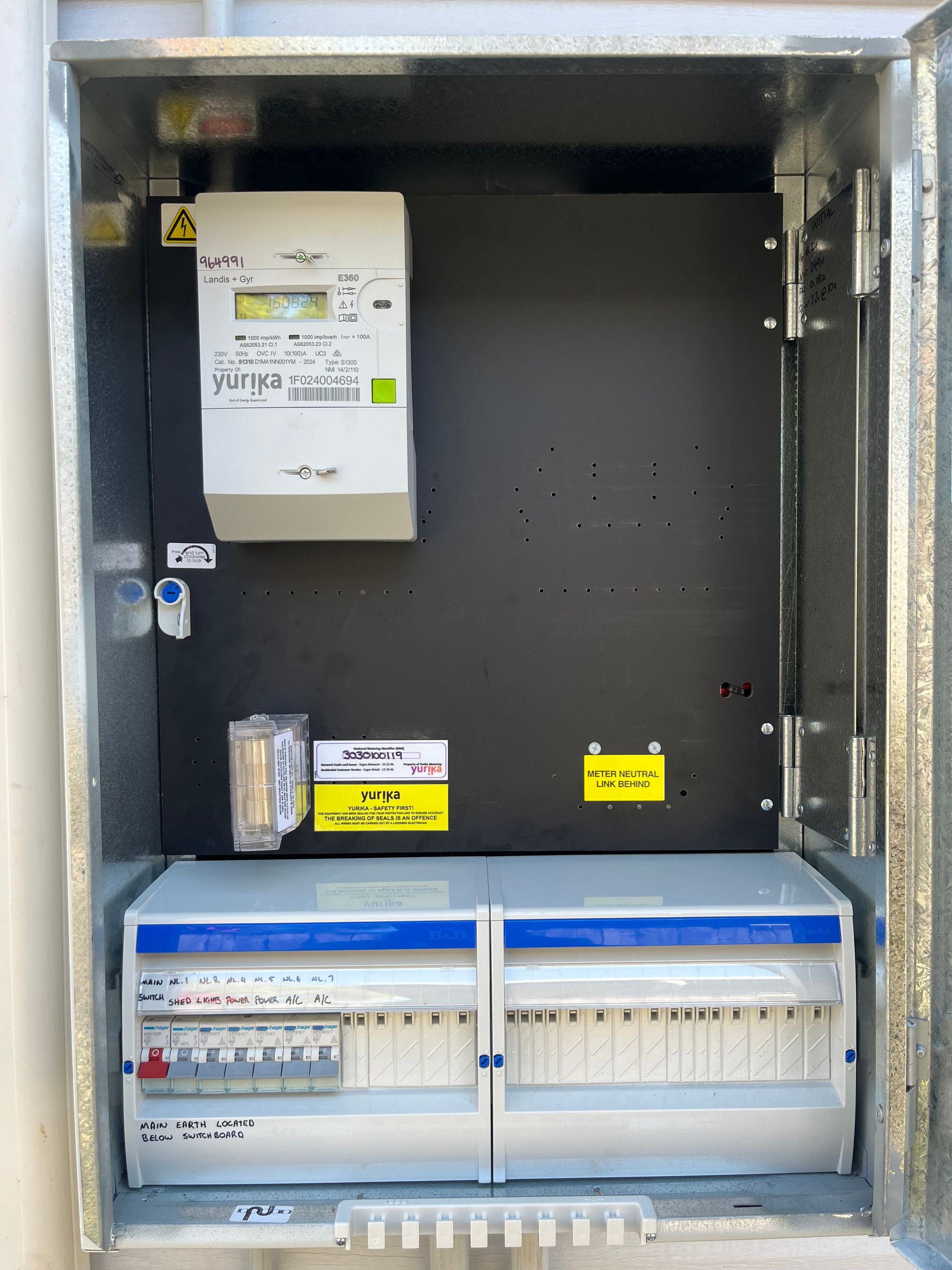 Open Electrical Panel Cabinet With Breakers — Top Spark Electrical FNQ in Mission Beach, QLD