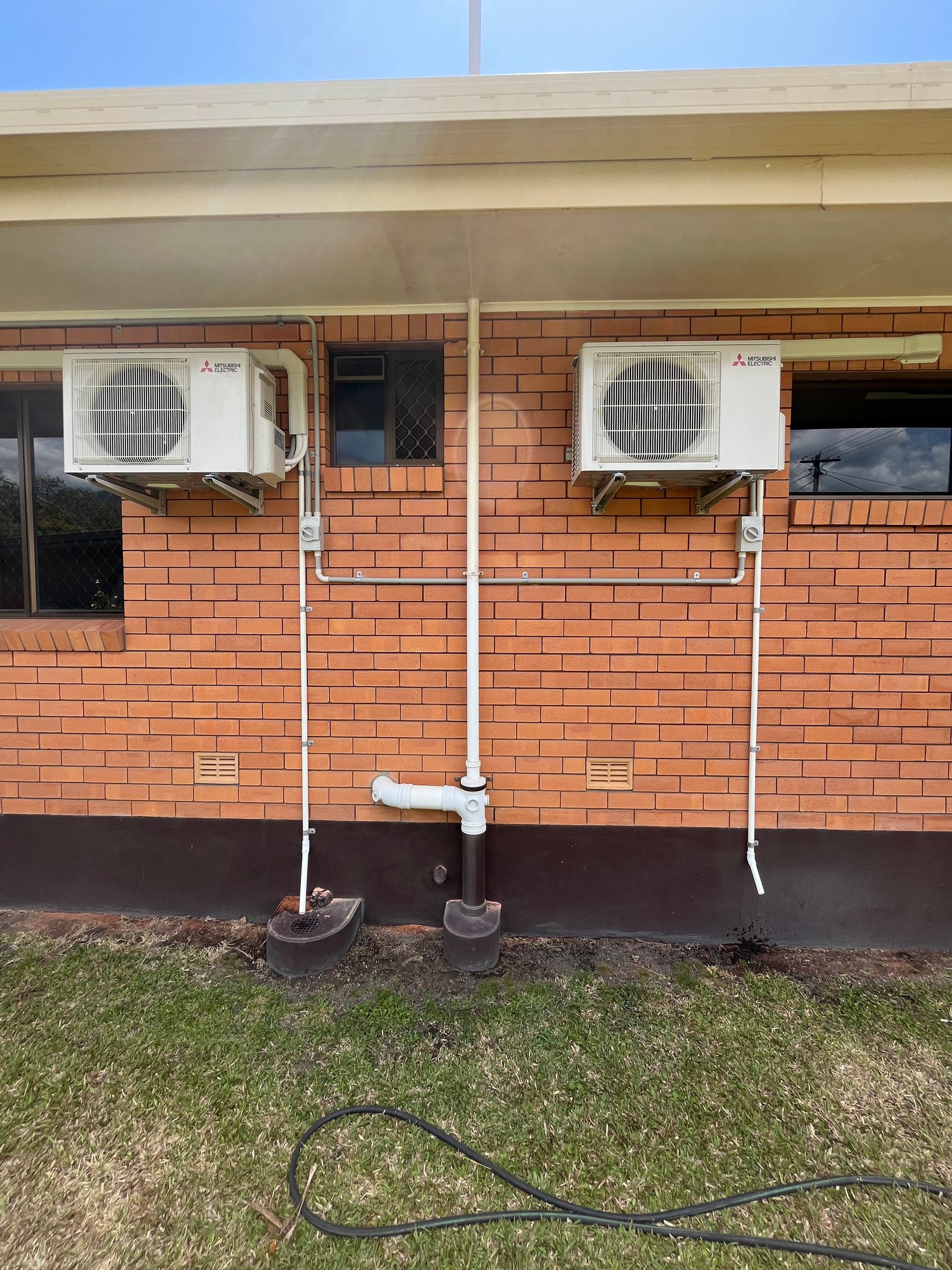 Wall-mounted Mitsubishi Air Conditioner Unit — Top Spark Electrical FNQ in Bayview Heights, QLD