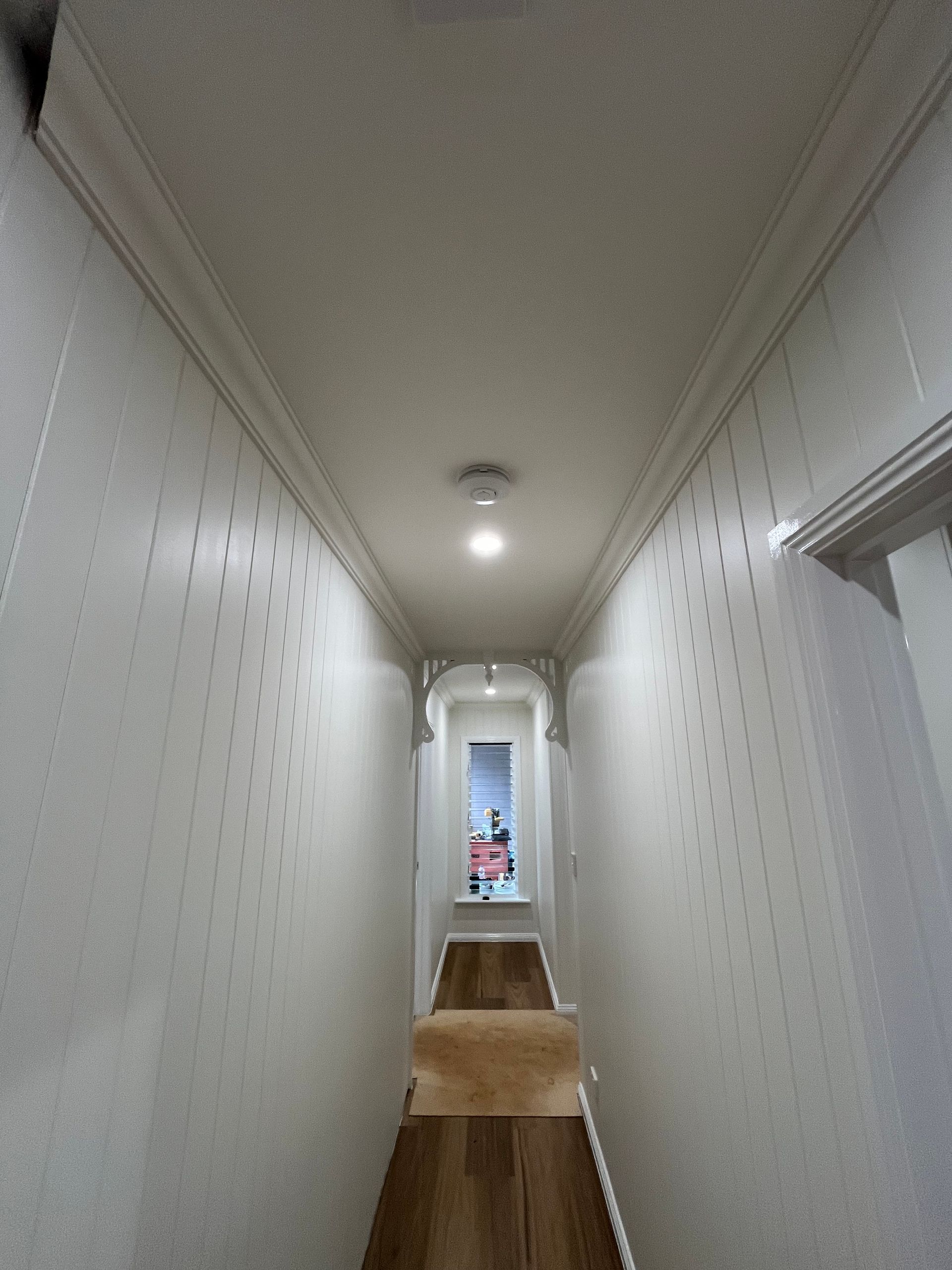 Empty White Room With Ceiling Fan, and Air Conditioner — Top Spark Electrical FNQ in Bayview Heights, QLD