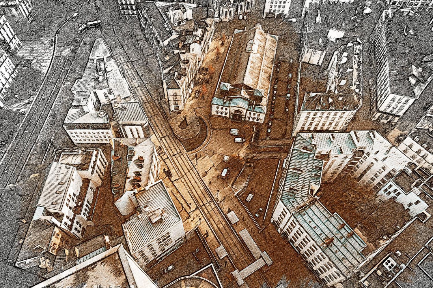 Eine Luftaufnahme einer Stadt mit vielen Gebäuden und Straßen.
