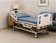 Adjustable hospital bed with blue mattress and raised metal side rails