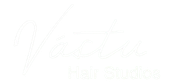 Faint white script logo reading “Vestia” over “Studio” on a white background