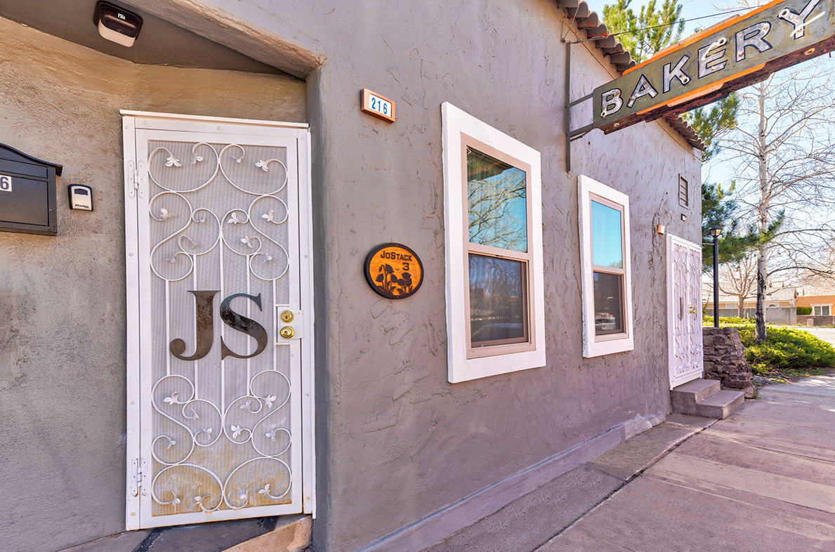 A bakery with a sign above the door that says `` js ''.