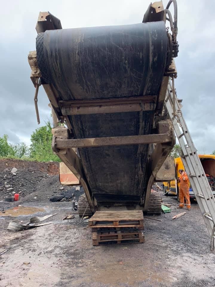 A Large Conveyor Belt Is Sitting on Top of A Wooden Pallet — Conveyor Maintenance Services In Charters Towers, QLD