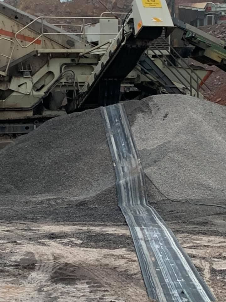 White Conveyor Belts In Construction Site — Conveyor Maintenance Services In Bohle, QLD