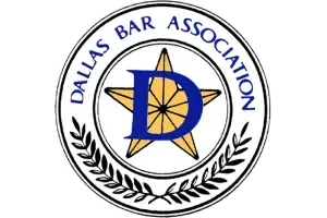 Dallas Bar Association logo with a blue “D” over a gold star and laurel wreath