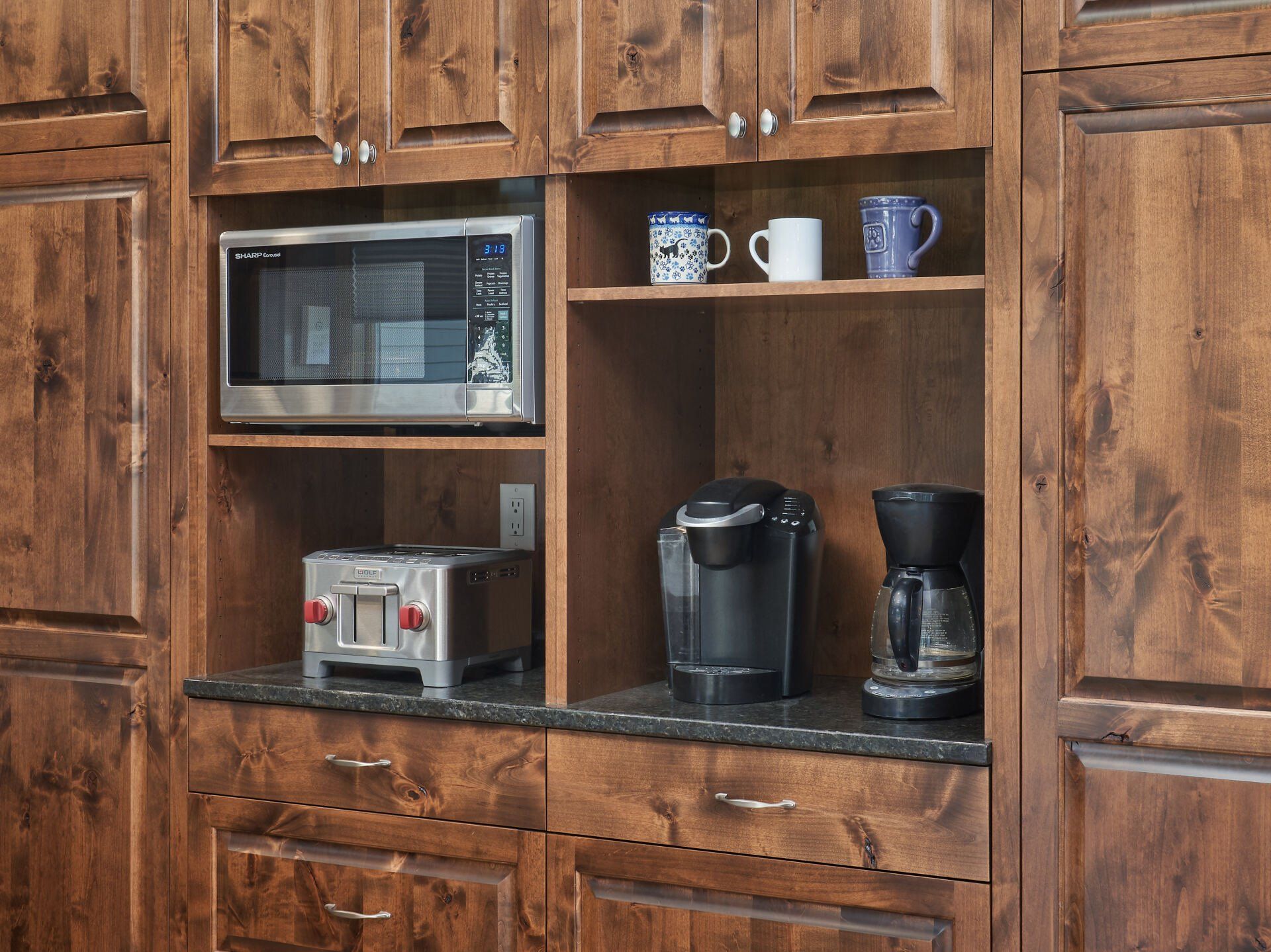 Kitchen renovation in Woodbury featuring reclaimed wood cabinets and coffee bar.