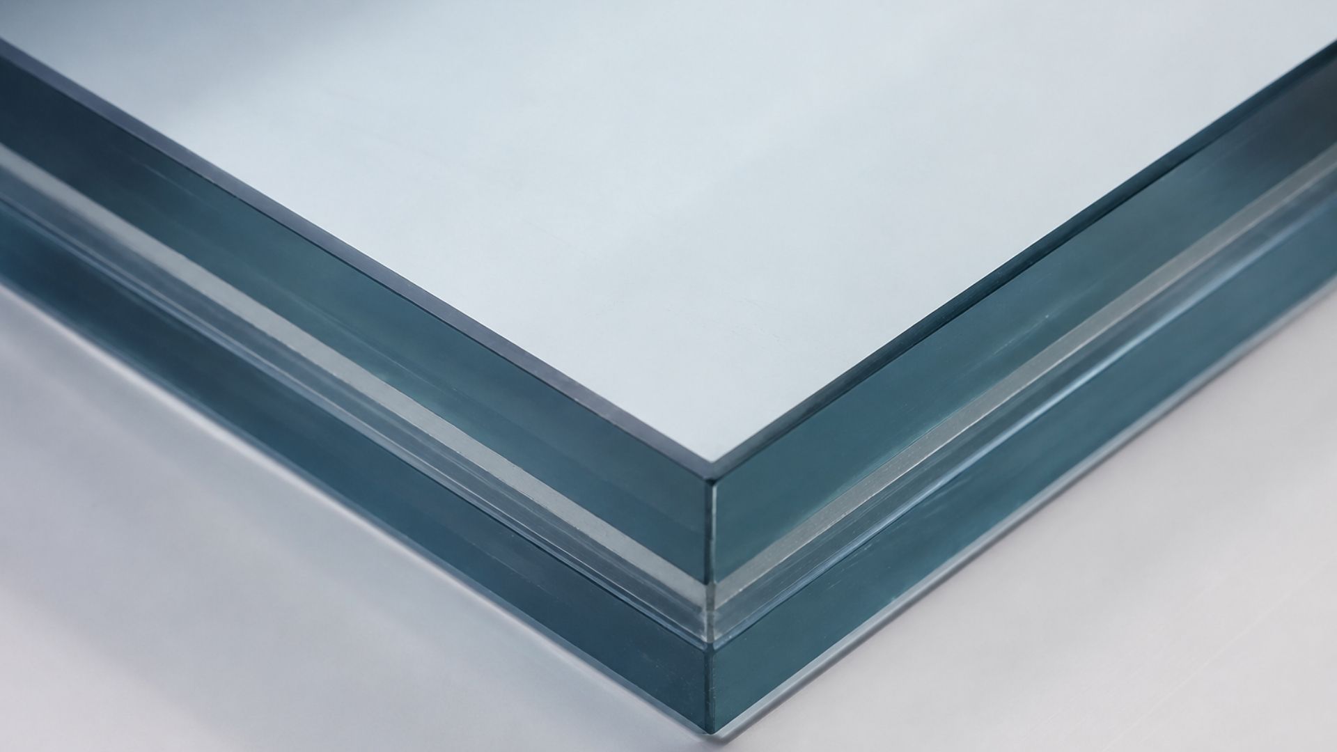What are SentryGlas Plus (SGP) interlayers and what role do they play in laminated glass application
