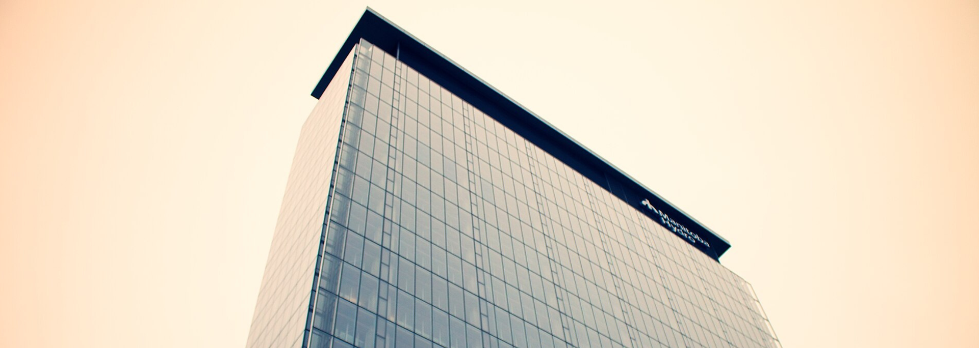 Picture of a tall glass building. 