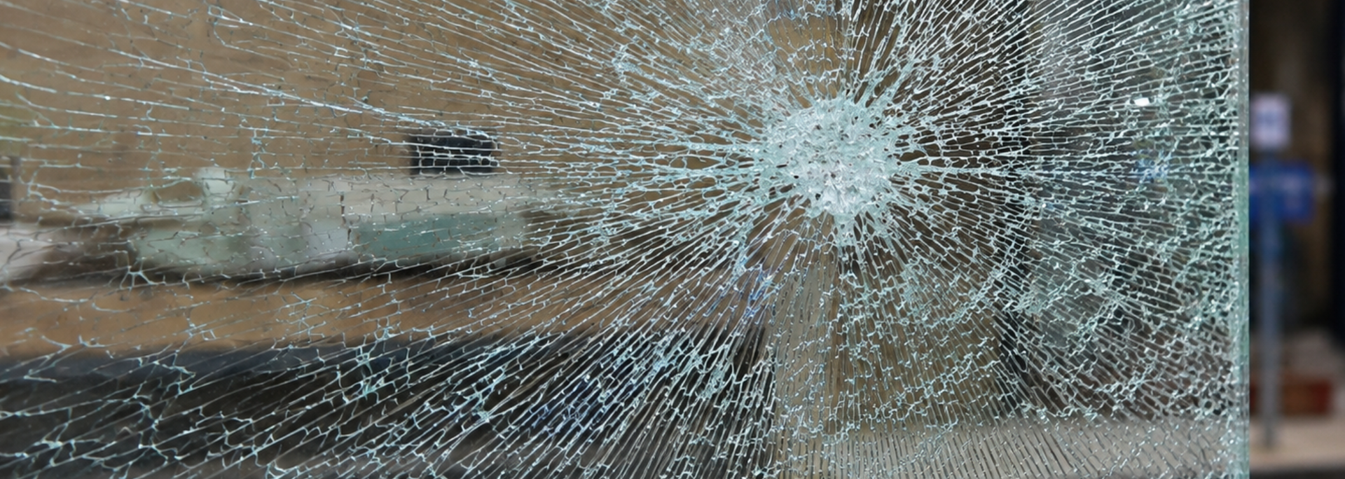 Picture of a damaged pane of glass. Picture of a damaged pane of glass.