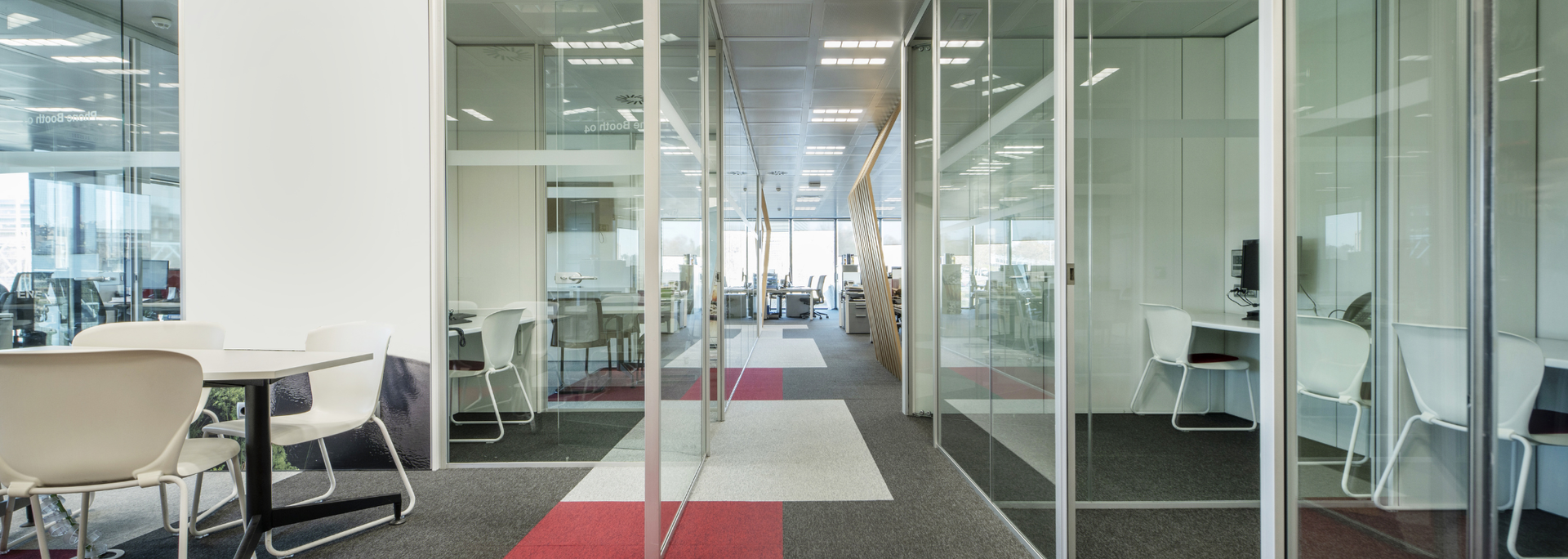 Picture of a office with glass partitions. Picture of a office with glass partitions.