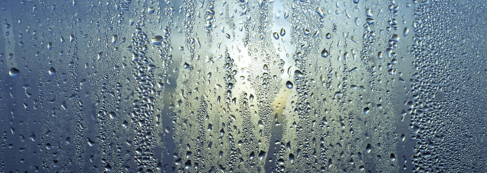 Picture of water running down a window. Picture of water running down a window.
