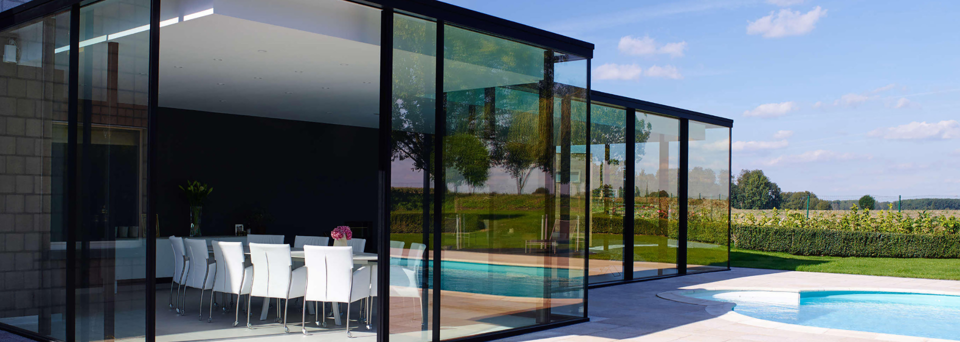 Picture of a modern glass building. Picture of a modern glass building.
