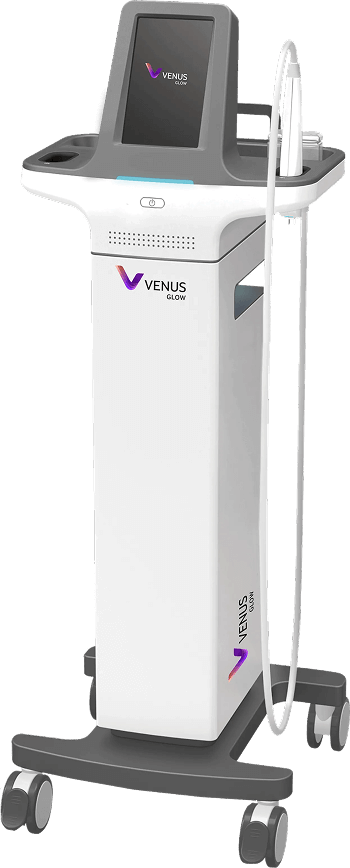 Un appareil médical Venus Glow blanc sur une base à roulettes, doté d'un écran, d'accessoires et d'un logo.