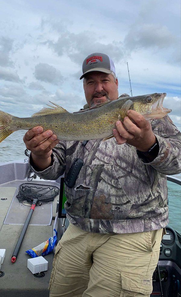 man holding fish