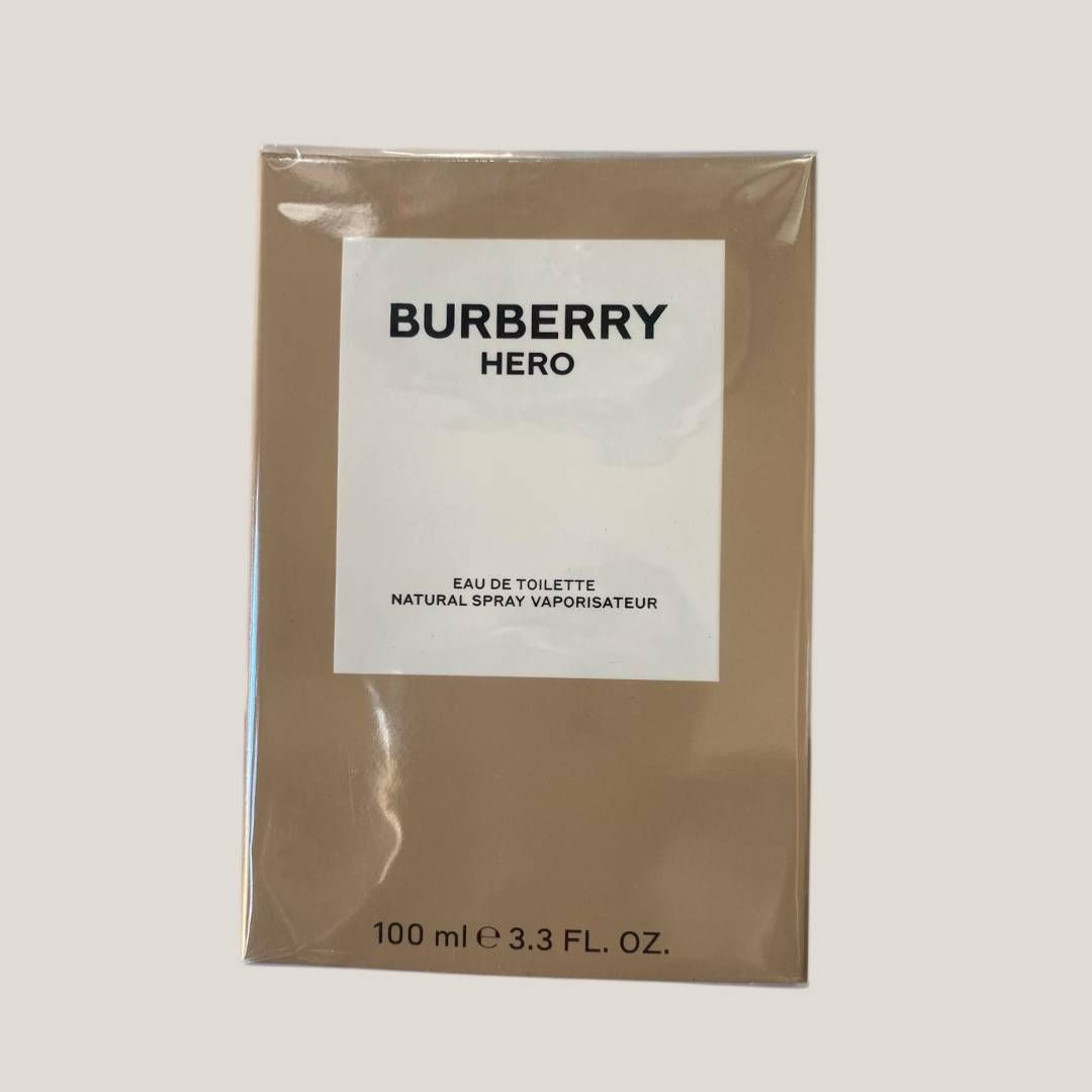 Frasco de eau de toilette Burberry Hero en envase marrón y blanco, 100 ml.