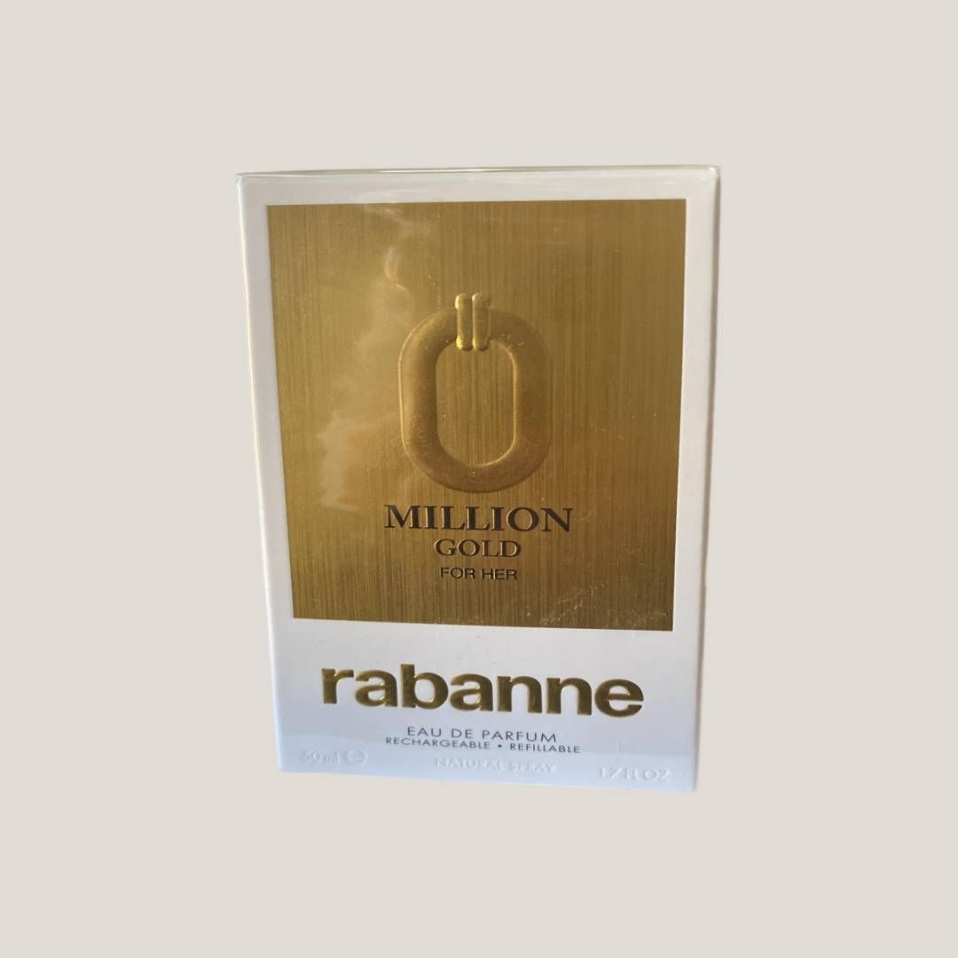 Caja de perfume Rabanne Million Gold con envase dorado y blanco.