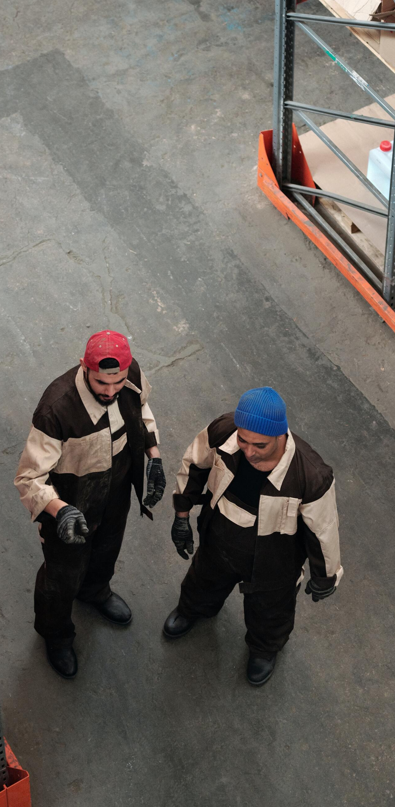 men on concrete floor
