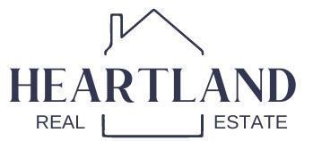 Heartland Real Estate logo with house roof icon in dark blue and gray text
