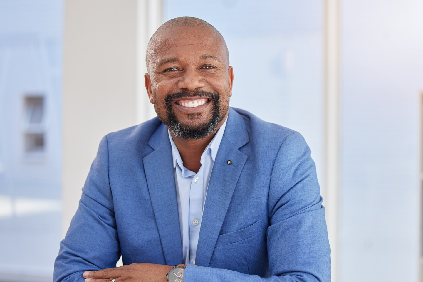 Black businessman sitting in need of executive coaching