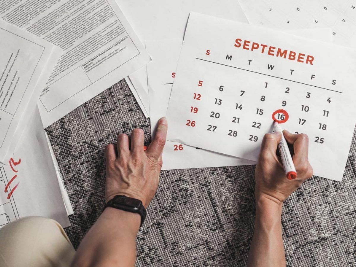 Professional-level job seeker preparing calendar for September employment hiring opportunities