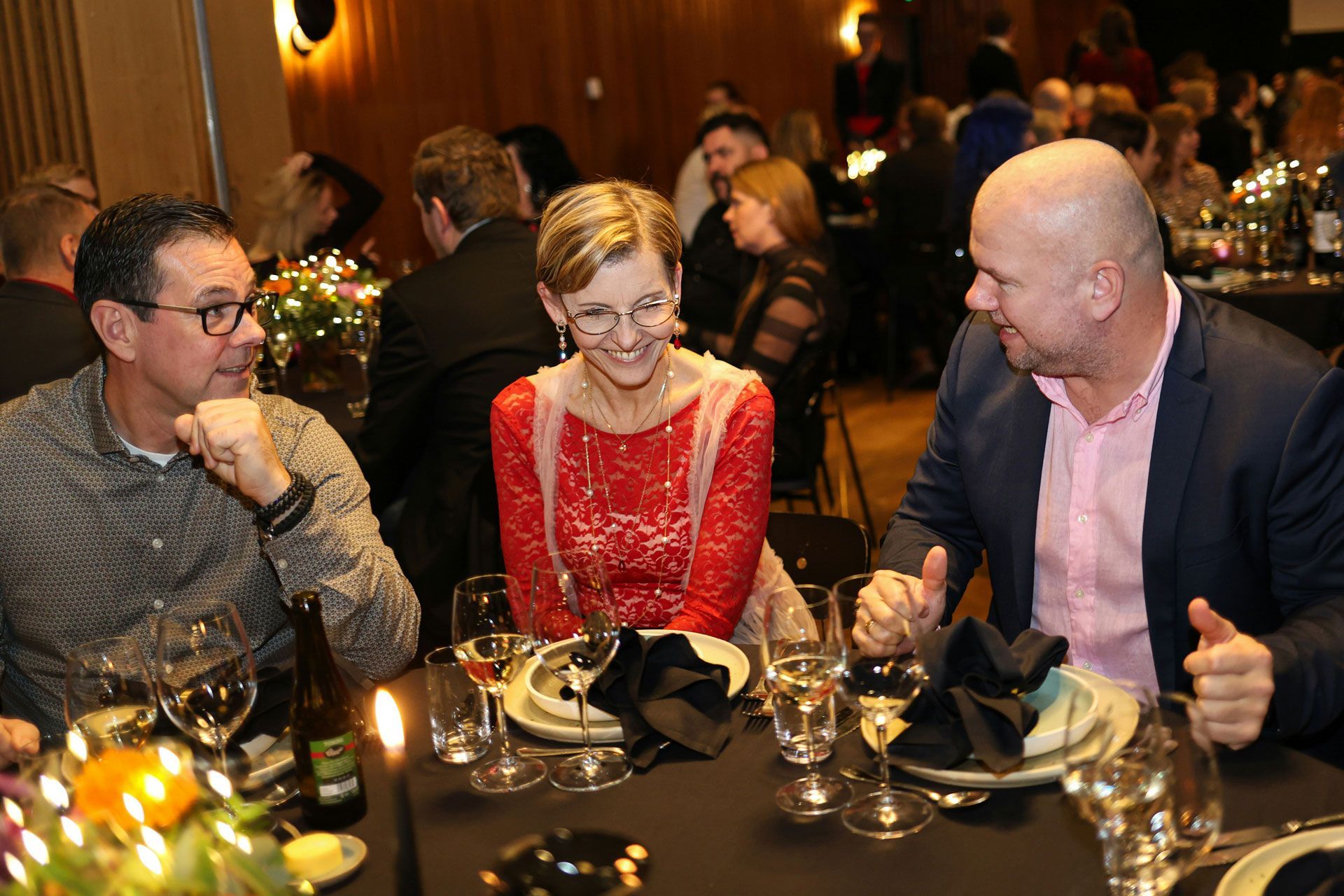 executive job seeker talking to two potential contacts at a company that is hiring a CFO