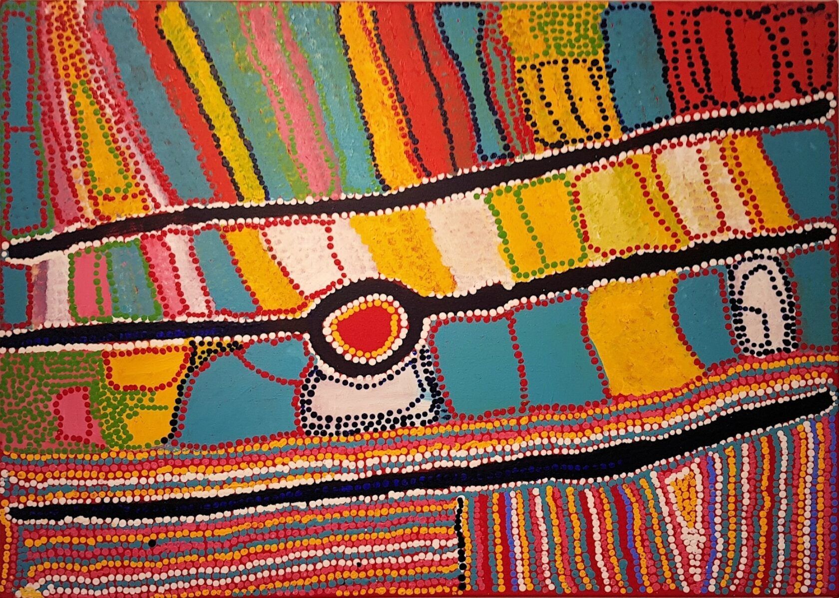 A colorful painting with a red circle in the middle