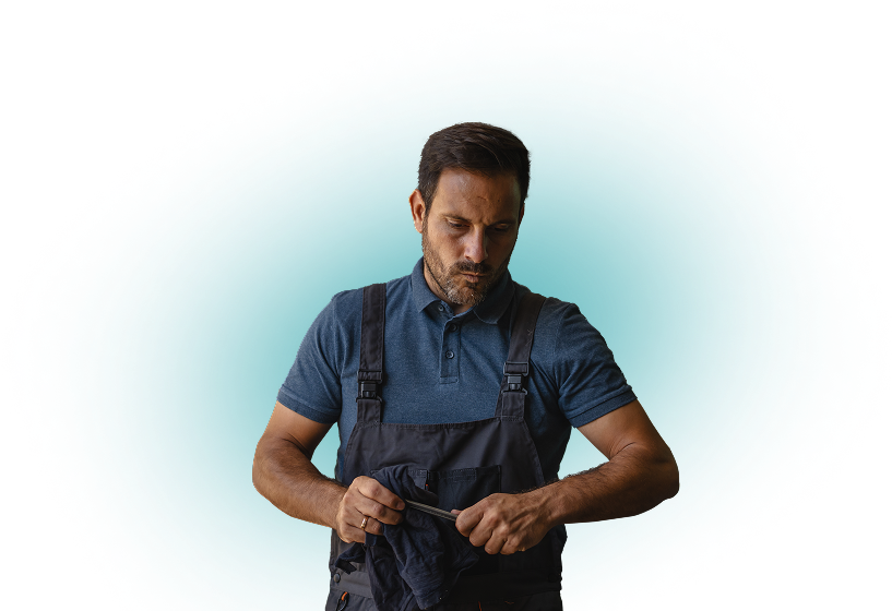 Technician thinking holding tool | Felix Auto Service