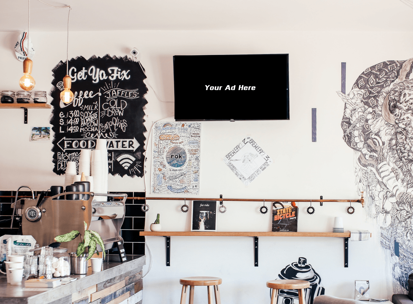Coffee shop interior with a TV displaying 