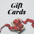 Gift cards with a red ribbon and bow on a white background