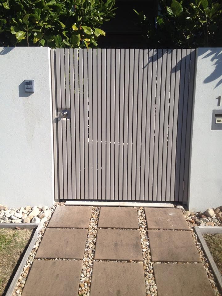 The Number 1 is on the Wall Behind the Gate — Sunshine Gates in Kunda Park, QLD
