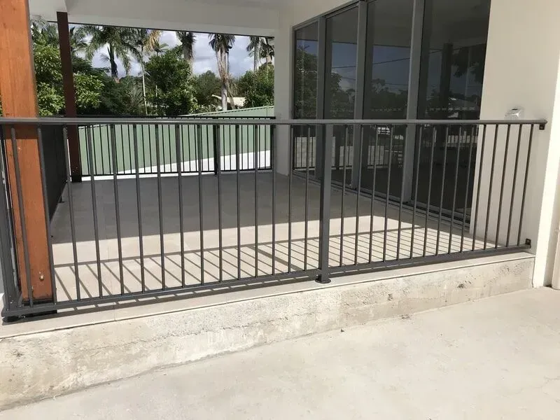 A Balcony With a Metal Railing and a Concrete Floor — Sunshine Gates in Kunda Park, QLD