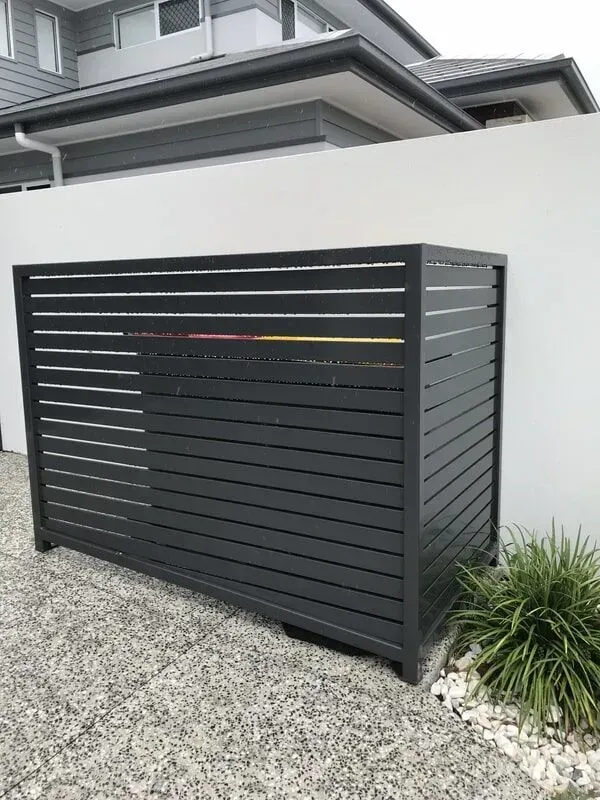 A Black Fence is Sitting in Front of a House — Sunshine Gates in Kunda Park, QLD