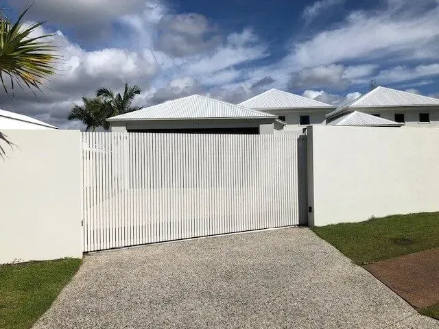 A White House With a White Fence and a White Gate — Sunshine Gates in Kunda Park, QLD