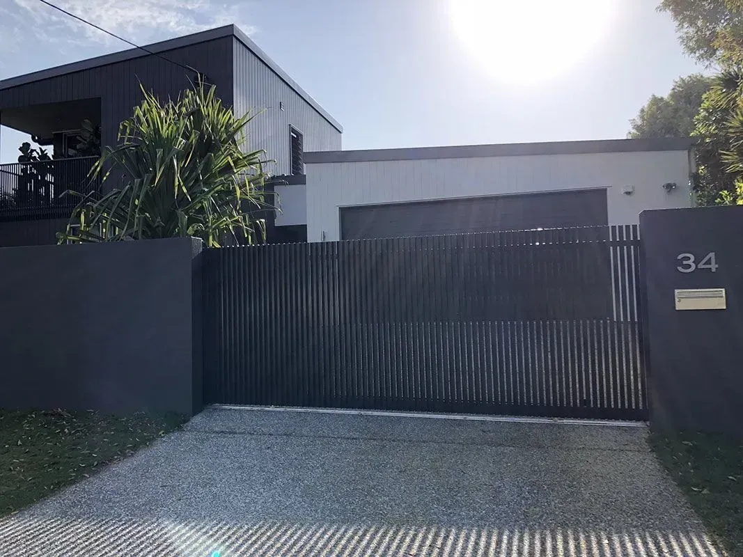 A House With a Sliding Gate and a Mailbox in Front of It — Sunshine Gates in Kunda Park, QLD