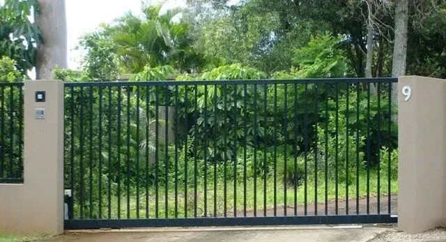 A Sliding Gate With the Number 9 on It — Sunshine Gates in Kunda Park, QLD