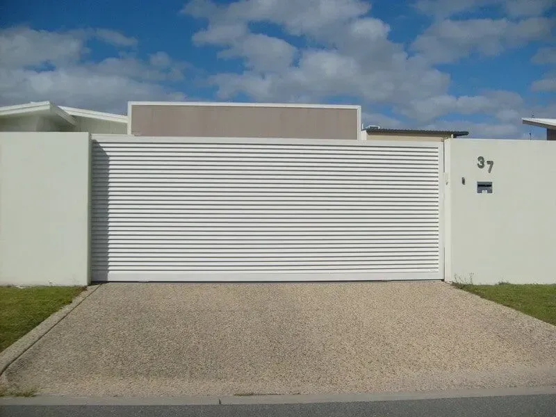 A White Garage Door With the Number 37 on It — Sunshine Gates in Kunda Park, QLD