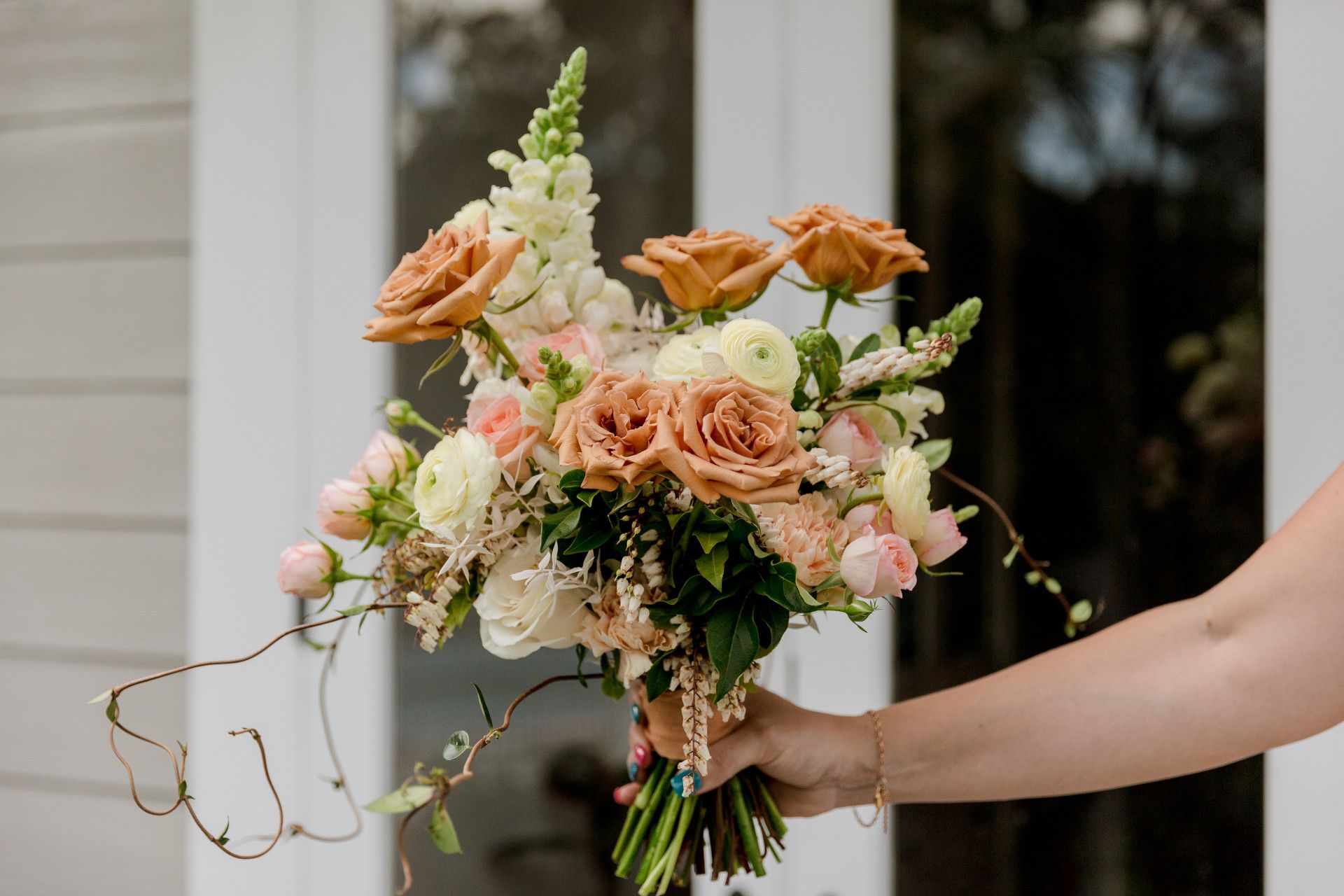 A basket of wedding flowers and loose petals — Ivy & Ash Flowers & Gifts in Palmview, QLD