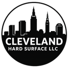 Cleveland Hard Surface LLC logo with black city skyline inside a circular black-and-white design