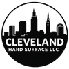 Cleveland Hard Surface LLC logo with black city skyline inside a circular black-and-white design