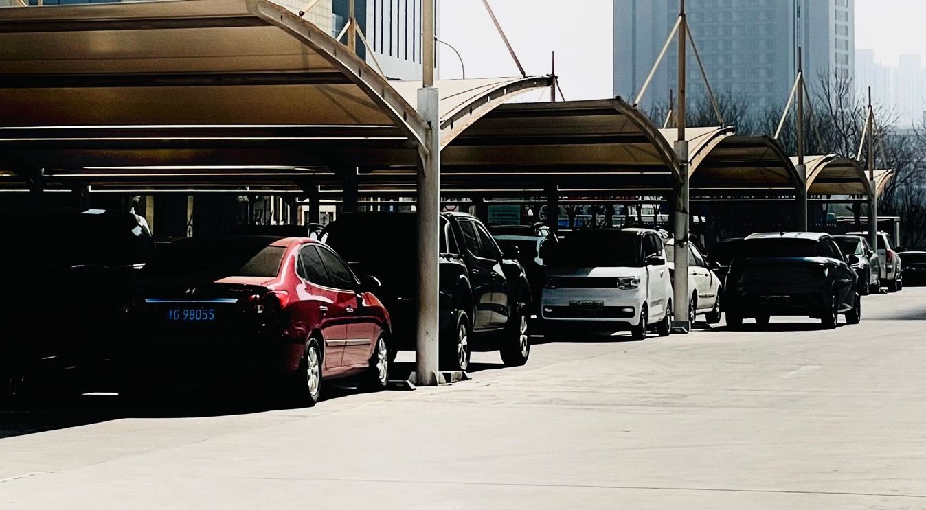 Vehicles parked under covered vehicle storage