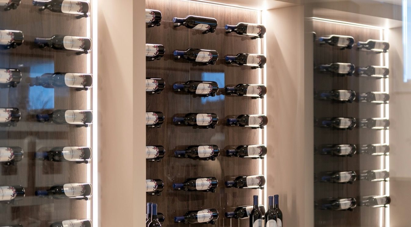 Wine bottles stored in a temperature-controlled wine storage room