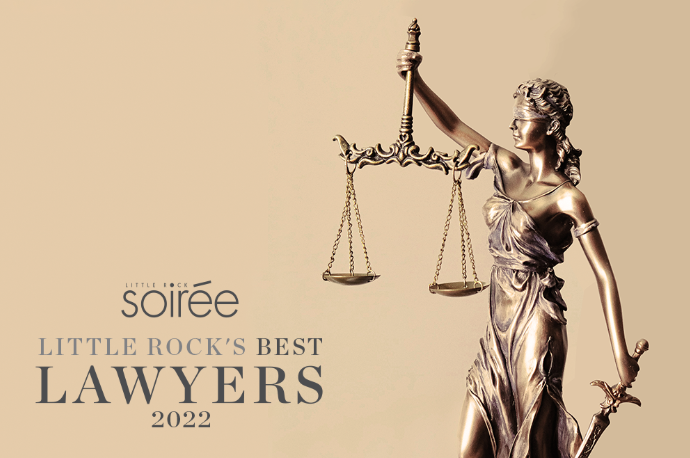 A statue of lady justice holding scales of justice