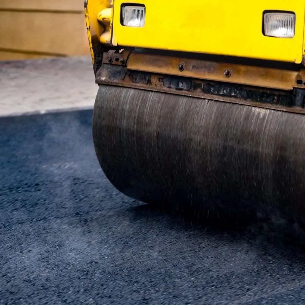 Asphalt paving company, asphalt compactor, image for Tri State Paving, asphalt contractor, NJ.
