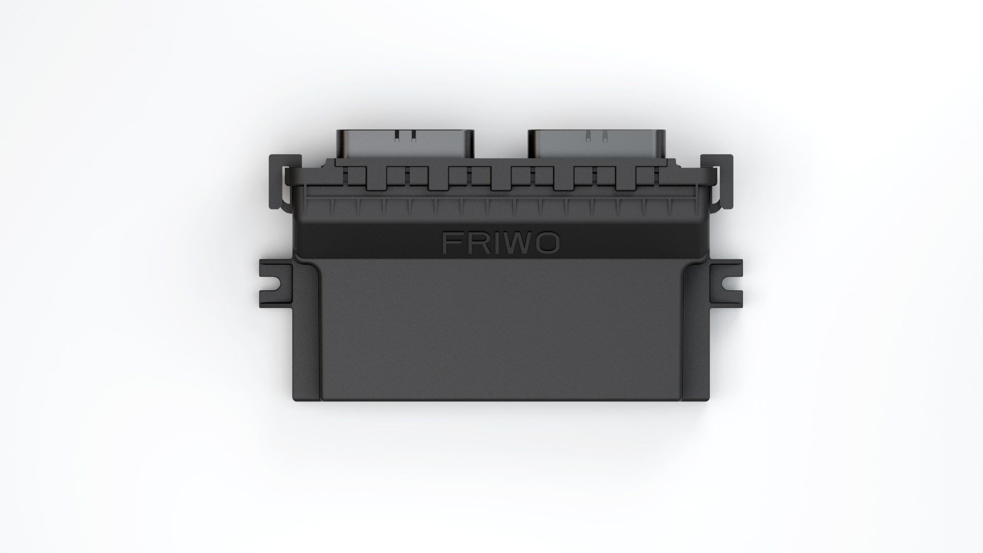 A black electronic device is sitting on a white surface.