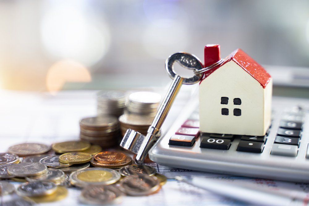 House Keychain With Calculator — Austin, TX — Property Management Of Texas